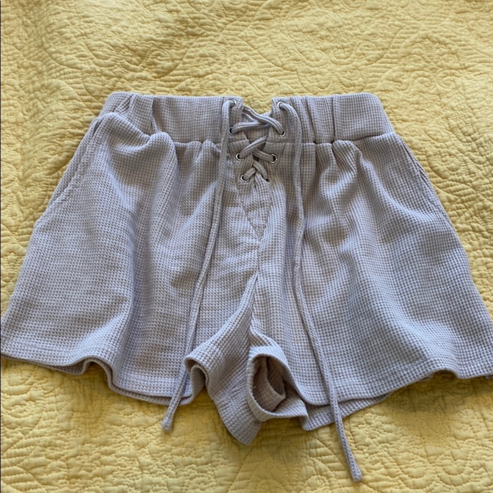 Princess polly tan stretchy shorts size 4